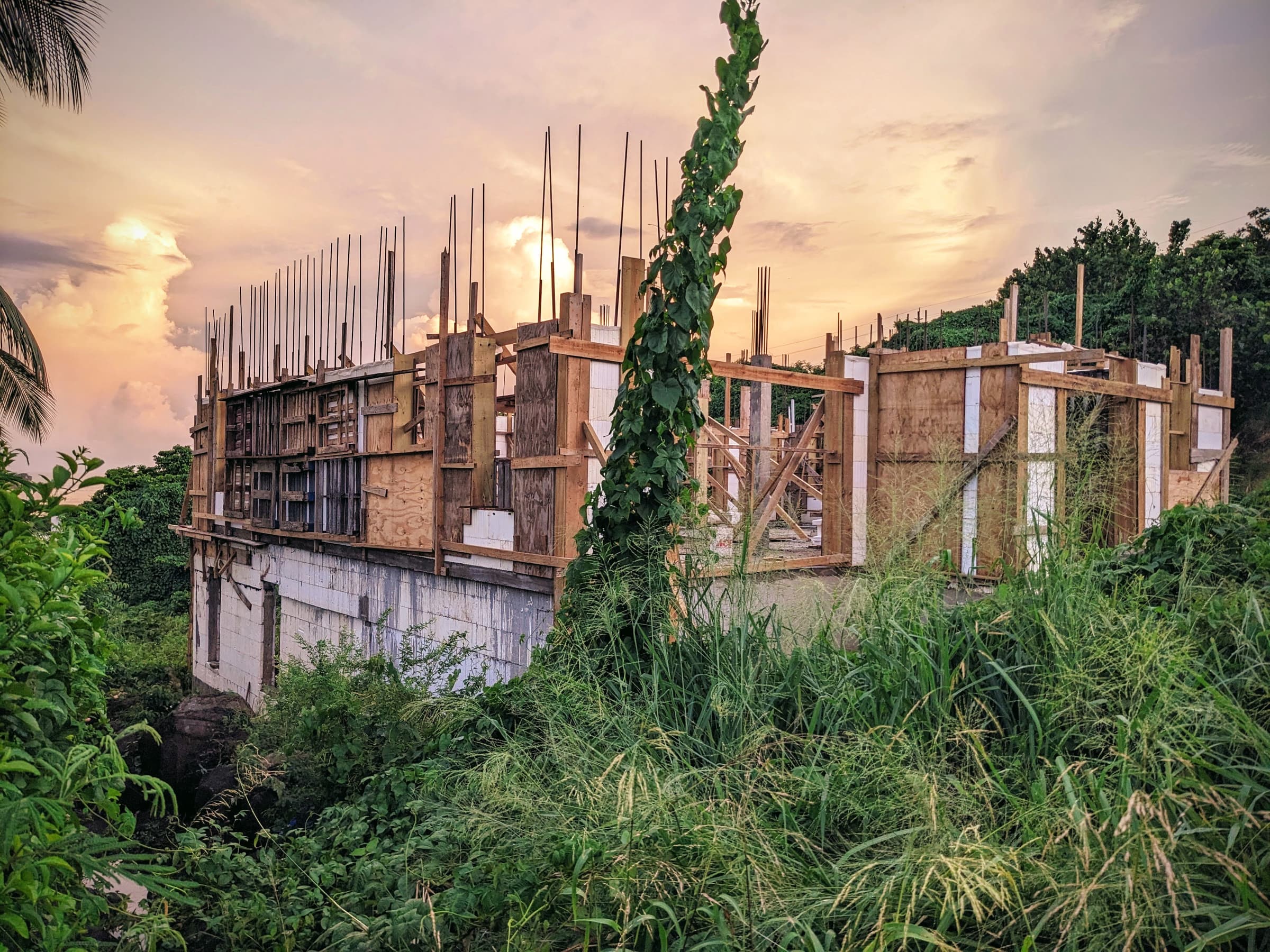 A house under construction at dusk
